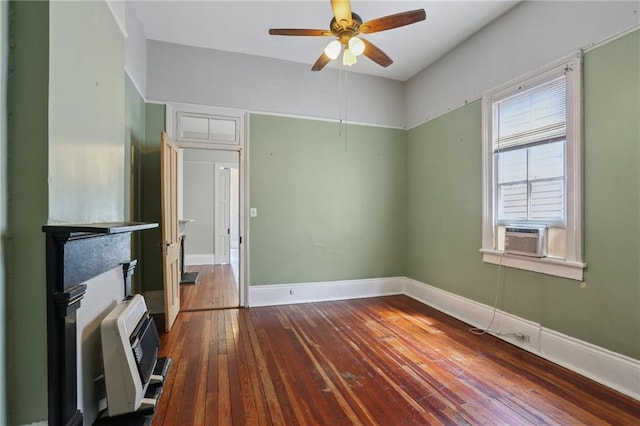820-22 N Salcedo St, New Orleans, LA 70119 - spare room featuring cooling unit, dark wood-style floors, and a ceiling fan