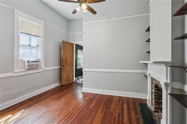 820-22 N Salcedo St, New Orleans, LA 70119 - unfurnished living room with ceiling fan, hardwood / wood-style flooring, a brick fireplace, and cooling unit