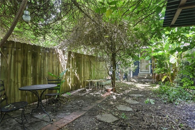 820-22 N Salcedo St, New Orleans, LA 70119 - view of yard featuring entry steps and a patio area