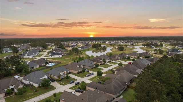 1104 Cypress Crossing Dr, Madisonville, LA 70447 - aerial view at dusk of a water view and a residential view