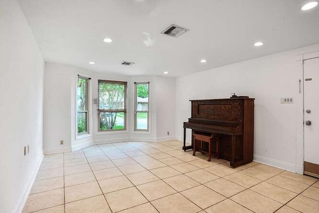 419 W William David Pkwy, Metairie, LA 70005 - unfurnished living room featuring recessed lighting and light tile patterned flooring