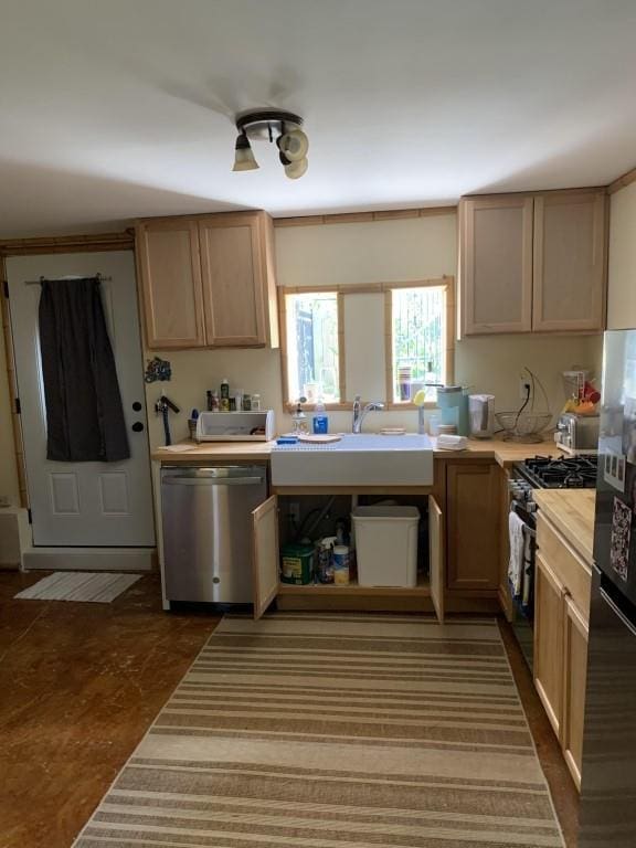 2527 Calhoun St, New Orleans, LA 70118 - kitchen featuring stainless steel appliances and light countertops