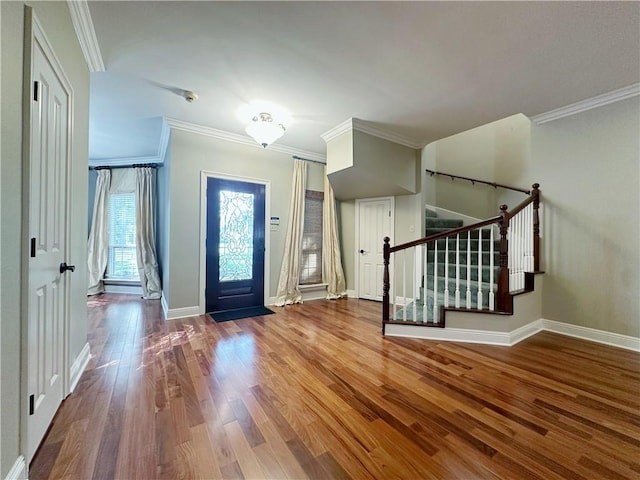 118 Golden Pheasant Dr, Slidell, LA 70461 - foyer entrance with wood finished floors, stairway, and ornamental molding