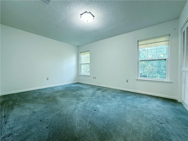 118 Golden Pheasant Dr, Slidell, LA 70461 - spare room featuring carpet floors and a textured ceiling