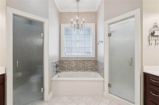 110 Lac Felicity Dr, Luling, LA 70070 - full bath with vanity, a bath, a stall shower, a chandelier, and tile patterned floors
