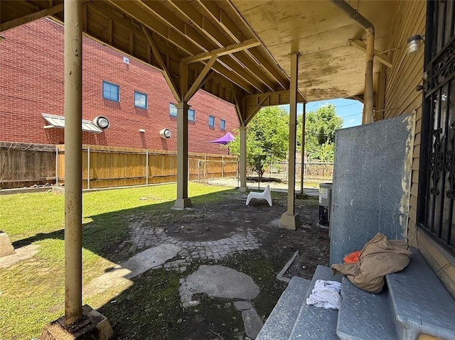 223335 Baronne St, New Orleans, LA 70113 - fenced backyard with a patio area