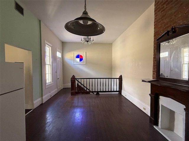 223335 Baronne St, New Orleans, LA 70113 - entryway with baseboards and hardwood / wood-style floors