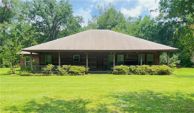 45156 Jenkins Rd 2 Rd, Franklinton, LA 70438 - view of front of house with a porch, a front lawn, and a metal roof