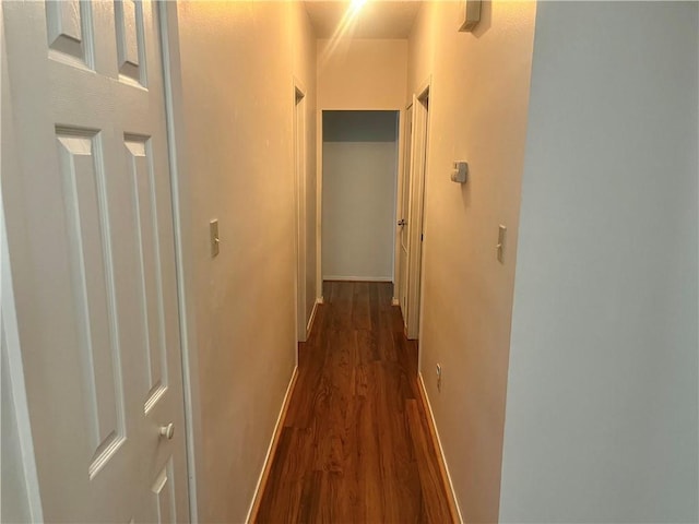 45156 Jenkins Rd 2 Rd, Franklinton, LA 70438 - hallway featuring dark wood-type flooring and baseboards