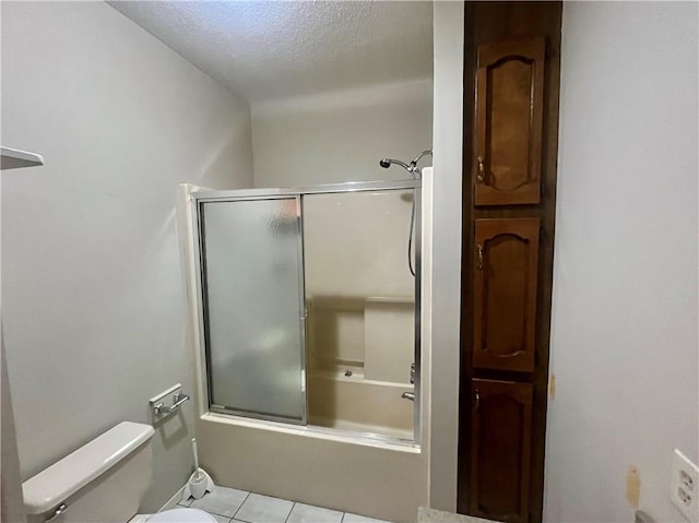 45156 Jenkins Rd 2 Rd, Franklinton, LA 70438 - full bath with enclosed tub / shower combo, tile patterned flooring, and a textured ceiling