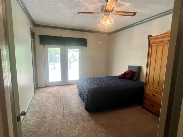 45156 Jenkins Rd 2 Rd, Franklinton, LA 70438 - bedroom with french doors, access to outside, carpet, crown molding, and a textured ceiling