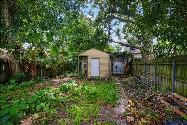 21921 Vallette St, New Orleans, LA 70114 - view of shed with a fenced backyard