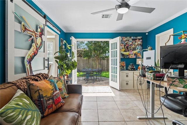 4301 Napoli Dr, Metairie, LA 70002 - living area with crown molding, a ceiling fan, tile patterned floors, and a desk