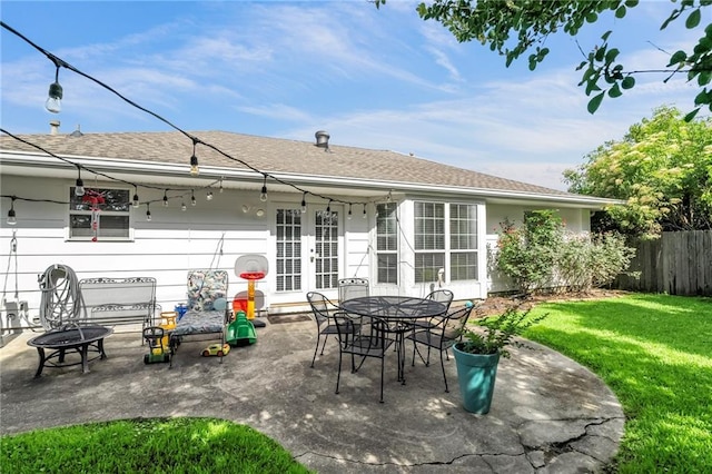 4301 Napoli Dr, Metairie, LA 70002 - view of patio / terrace featuring french doors and an outdoor fire pit