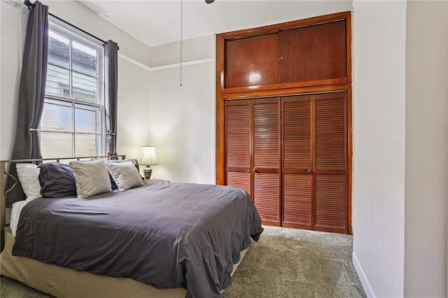 751618 Willow St, New Orleans, LA 70118 - bedroom with carpet floors, a closet, and a ceiling fan
