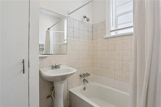 751618 Willow St, New Orleans, LA 70118 - bathroom featuring shower / bathtub combination with curtain and tile walls