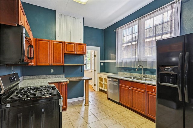 751618 Willow St, New Orleans, LA 70118 - kitchen featuring black appliances, open shelves, light tile patterned flooring, light countertops, and brown cabinetry