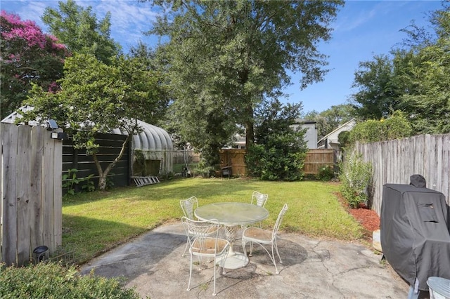 751618 Willow St, New Orleans, LA 70118 - fenced backyard with a patio and outdoor dining space
