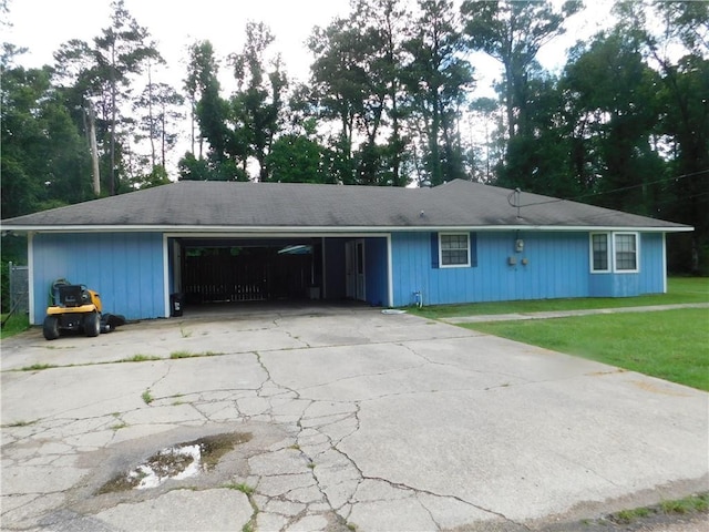 29000 Craig Dr, Hammond, LA 70403 - ranch-style home with driveway, a garage, and a front lawn