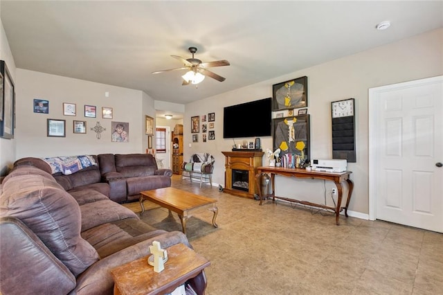 17126 Beacon St, Ponchatoula, LA 70454 - living area featuring a ceiling fan and a fireplace