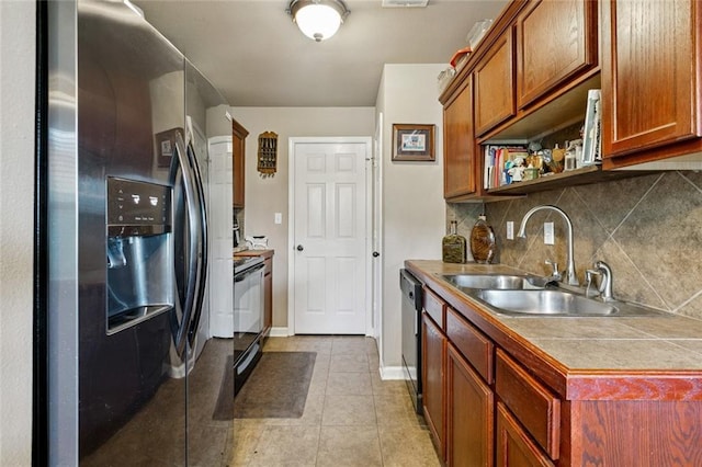 17126 Beacon St, Ponchatoula, LA 70454 - kitchen featuring stainless steel fridge with ice dispenser, black electric range oven, backsplash, dishwasher, and light tile patterned floors