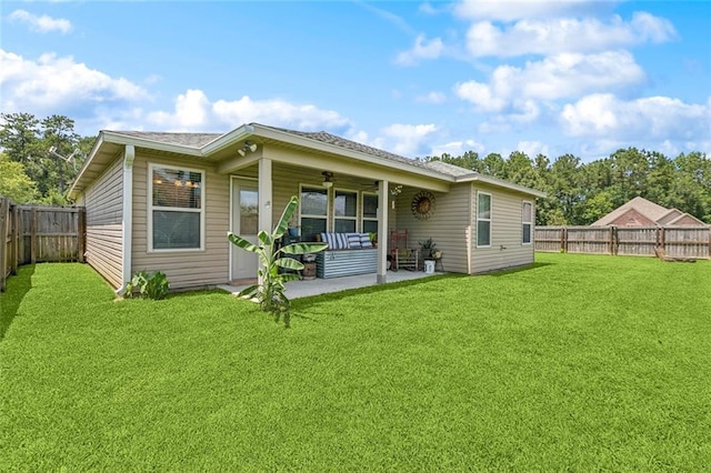 17126 Beacon St, Ponchatoula, LA 70454 - rear view of house with a fenced backyard