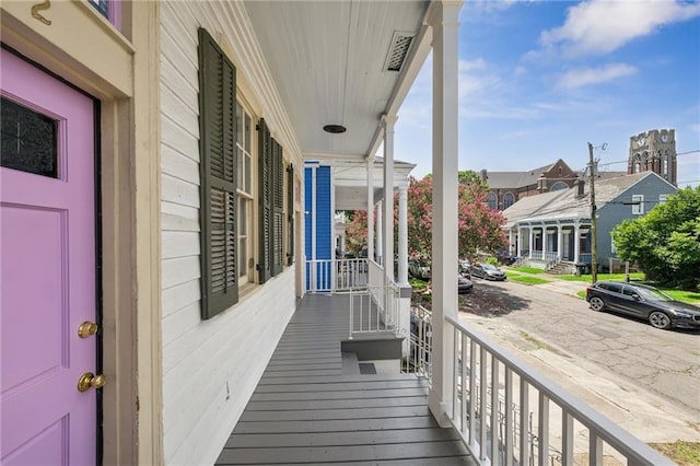 332 Olivier St, New Orleans, LA 70114 - porch featuring a residential view