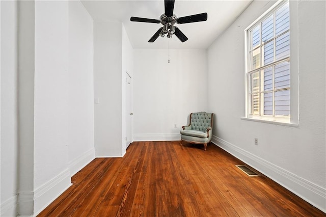 332 Olivier St, New Orleans, LA 70114 - unfurnished room featuring hardwood / wood-style flooring, healthy amount of natural light, and ceiling fan