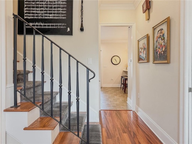 242 Douglas Dr, New Orleans, LA 70123 - stairway with ornamental molding and wood finished floors