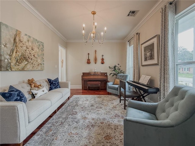 242 Douglas Dr, New Orleans, LA 70123 - living area featuring a chandelier, wood finished floors, and crown molding