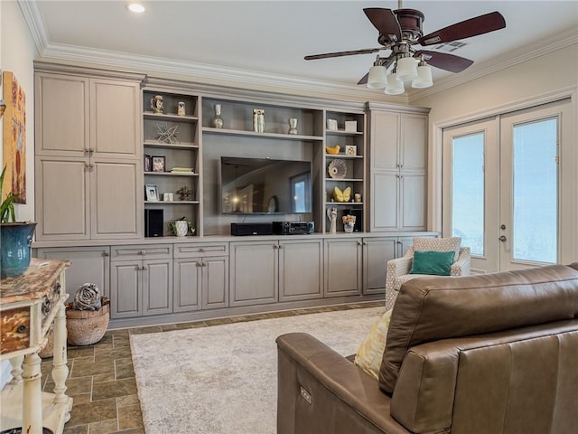 242 Douglas Dr, New Orleans, LA 70123 - living area featuring french doors, a ceiling fan, crown molding, and stone finish flooring
