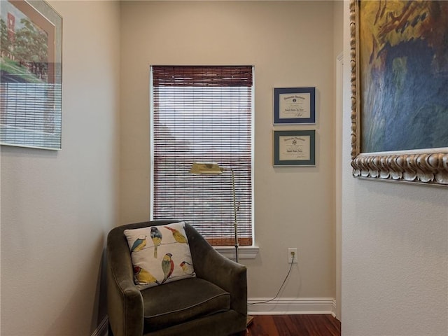 242 Douglas Dr, New Orleans, LA 70123 - sitting room featuring baseboards and dark wood-style floors