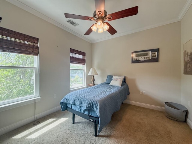 242 Douglas Dr, New Orleans, LA 70123 - carpeted bedroom featuring crown molding and ceiling fan
