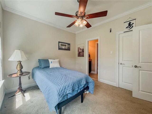 242 Douglas Dr, New Orleans, LA 70123 - carpeted bedroom featuring crown molding and a ceiling fan