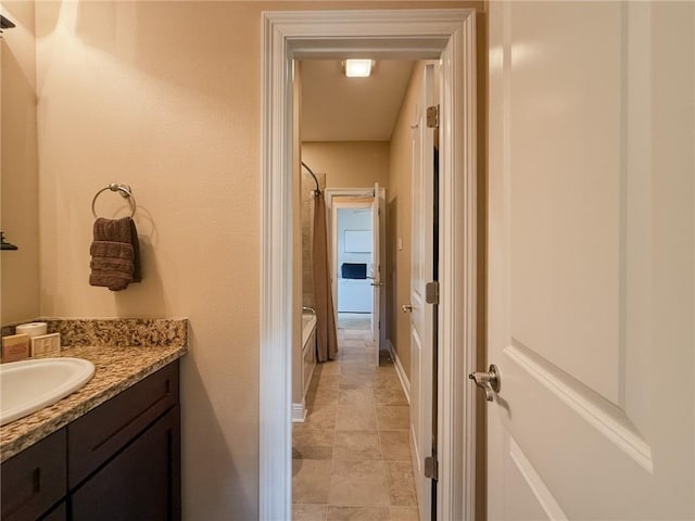 242 Douglas Dr, New Orleans, LA 70123 - bathroom with vanity, shower / bathtub combination, and tile patterned flooring