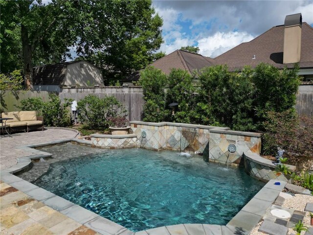 242 Douglas Dr, New Orleans, LA 70123 - view of swimming pool with a fenced backyard and a patio