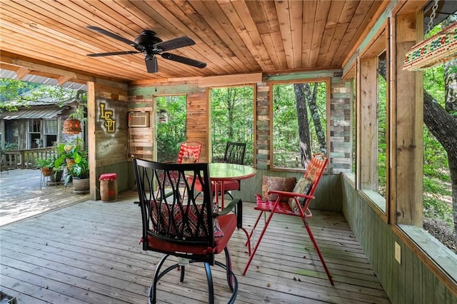 81011 Bob Baxter Rd, Bush, LA 70431 - sunroom with wooden ceiling, wood walls, a ceiling fan, wood-type flooring, and a wooden deck