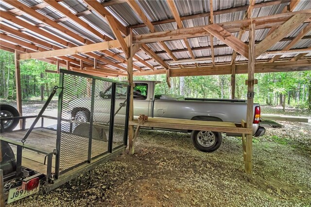 81011 Bob Baxter Rd, Bush, LA 70431 - view of parking featuring a carport