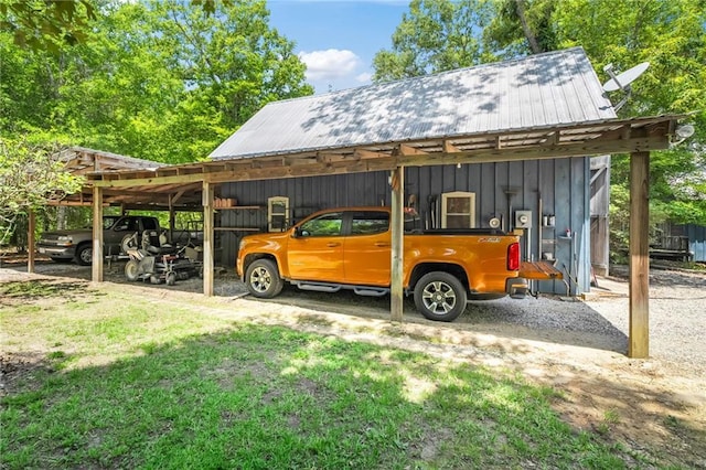 81011 Bob Baxter Rd, Bush, LA 70431 - view of vehicle parking featuring a detached carport and driveway