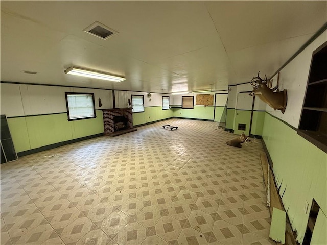 652 Central Ave, Reserve, LA 70084 - below grade area featuring a fireplace and baseboards