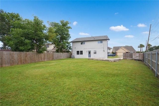3101 Lake Trail Dr, Metairie, LA 70003 - rear view of house with a fenced backyard
