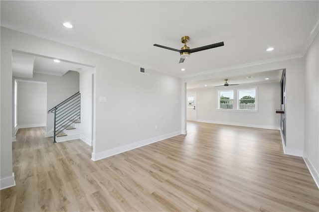 3101 Lake Trail Dr, Metairie, LA 70003 - empty room with ceiling fan, light wood finished floors, stairway, ornamental molding, and recessed lighting