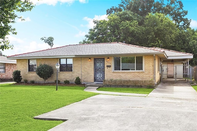 2417 Maine Ave, Metairie, LA 70003 - ranch-style house with driveway, a gate, and brick siding