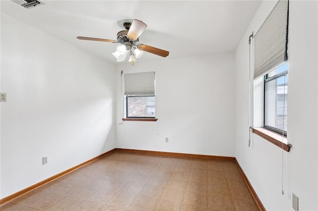 2417 Maine Ave, Metairie, LA 70003 - spare room with healthy amount of natural light, light flooring, and ceiling fan