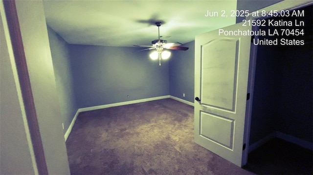 21573 Katina Ln, Ponchatoula, LA 70454 - spare room featuring dark carpet and ceiling fan