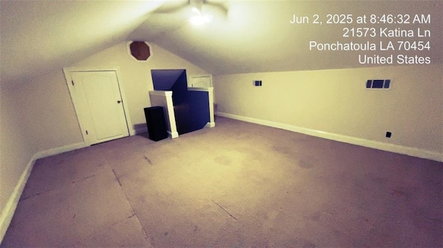 21573 Katina Ln, Ponchatoula, LA 70454 - additional living space with vaulted ceiling and carpet