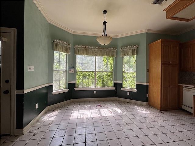 72075 Gum St, Abita Springs, LA 70420 - unfurnished dining area featuring light tile patterned floors and crown molding