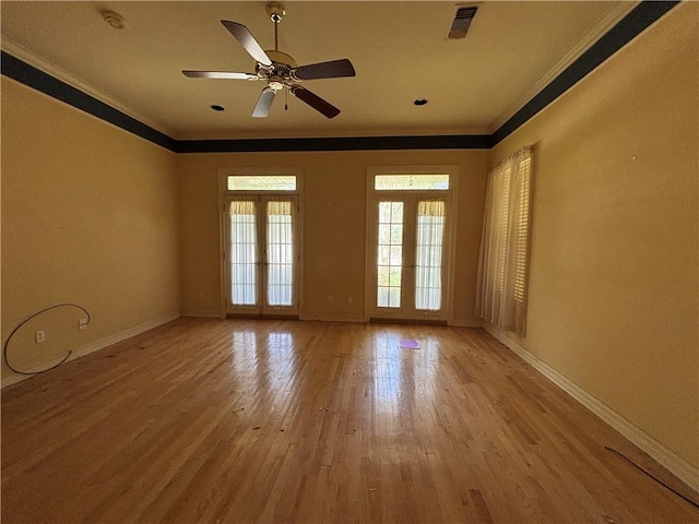 72075 Gum St, Abita Springs, LA 70420 - spare room featuring ornamental molding, wood finished floors, ceiling fan, and a smoke detector