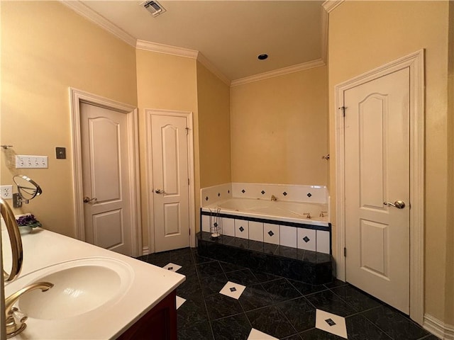 72075 Gum St, Abita Springs, LA 70420 - full bath featuring a whirlpool tub, crown molding, double vanity, and tile patterned floors