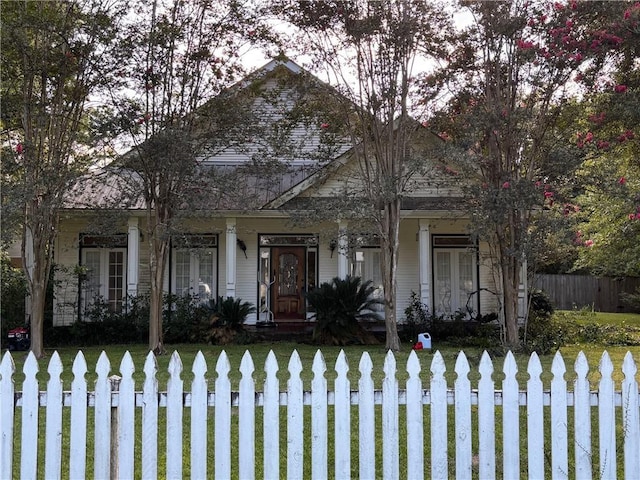 72075 Gum St, Abita Springs, LA 70420 - view of front of property with covered porch and a fenced front yard